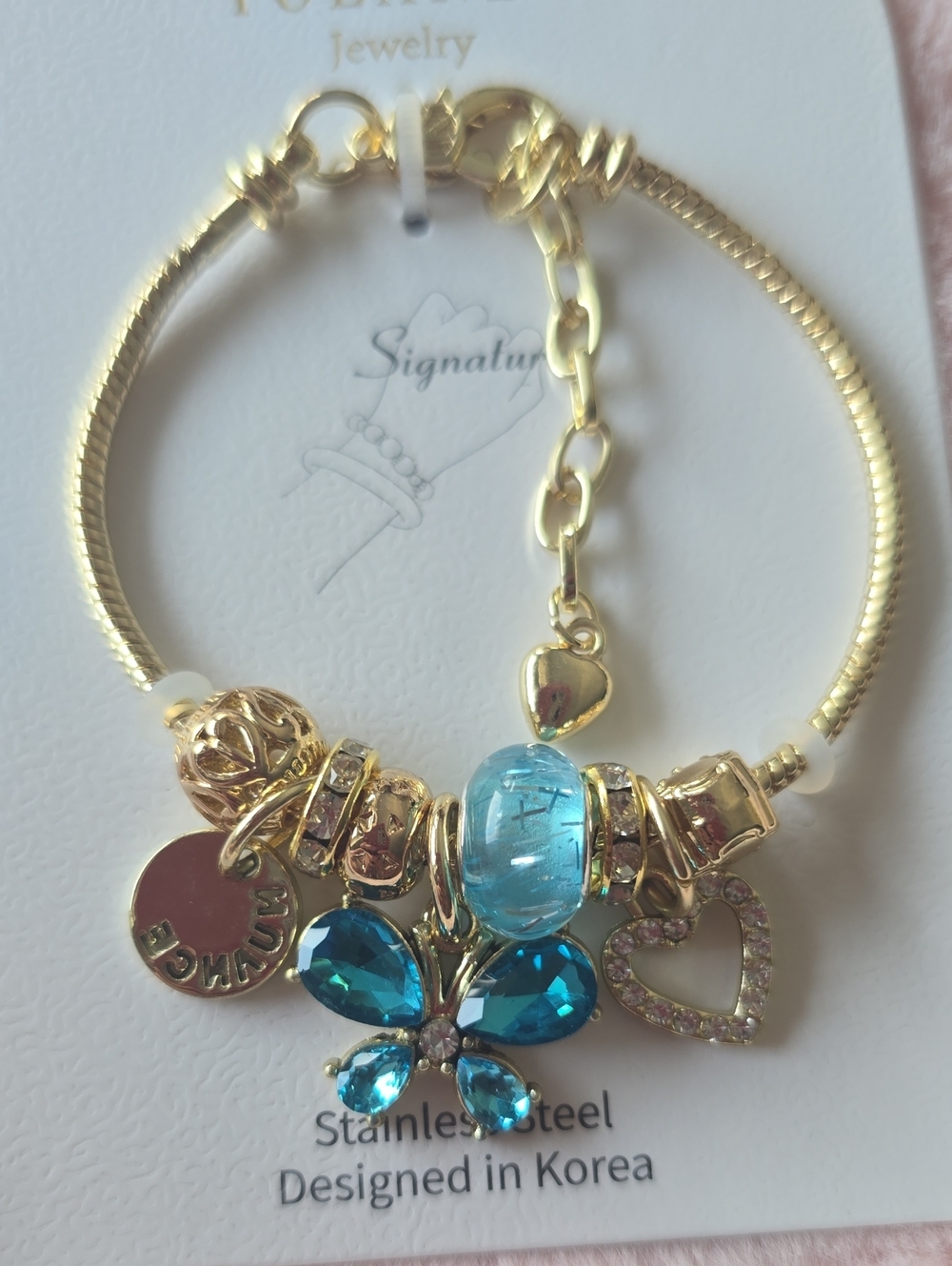 Signature Gold-Tone Bracelet with Blue Crystal Charm